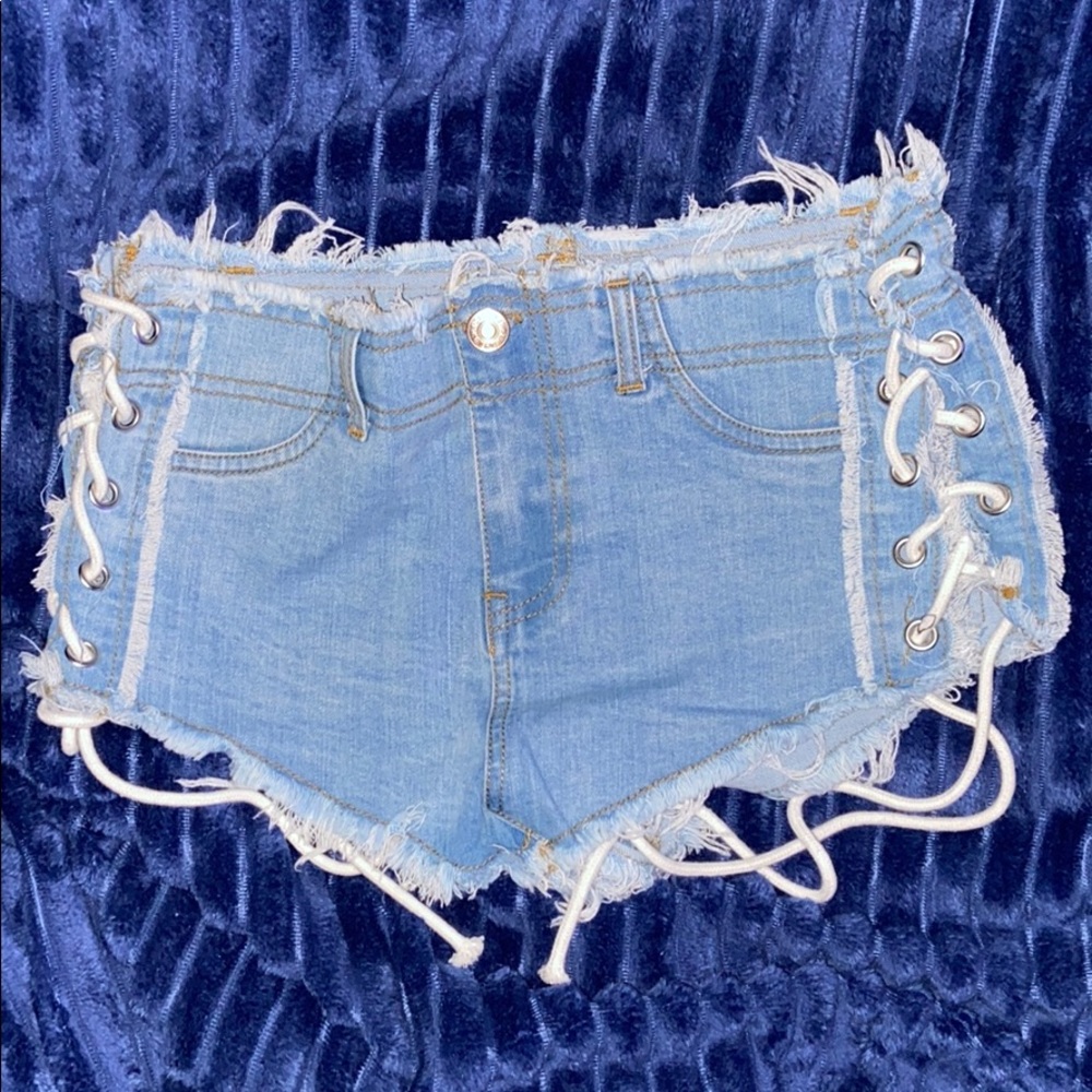 Light Denim Distressed Shorts